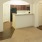 living room with kitchen adjacent